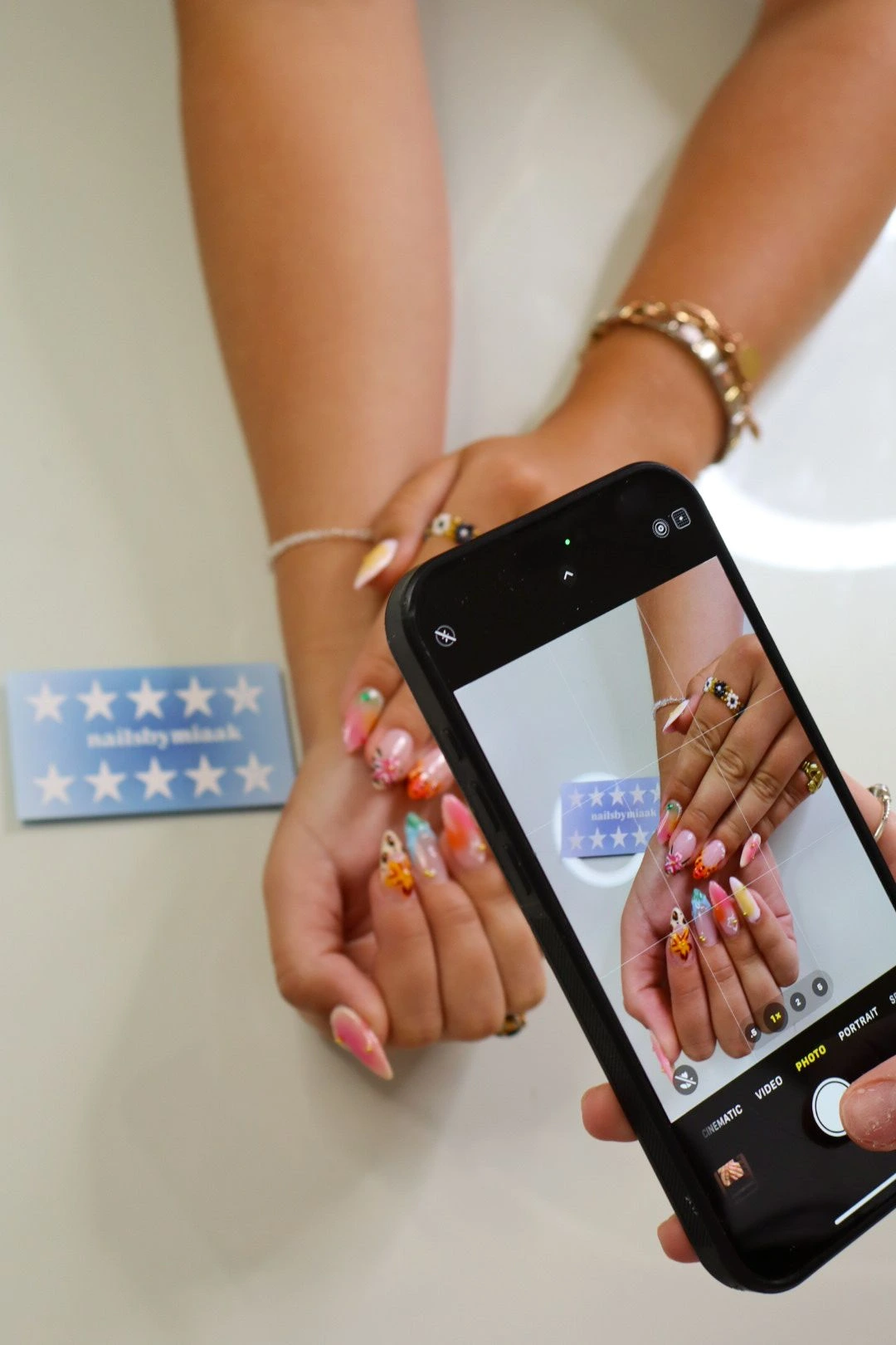 Styled nail products photographed for a brand campaign